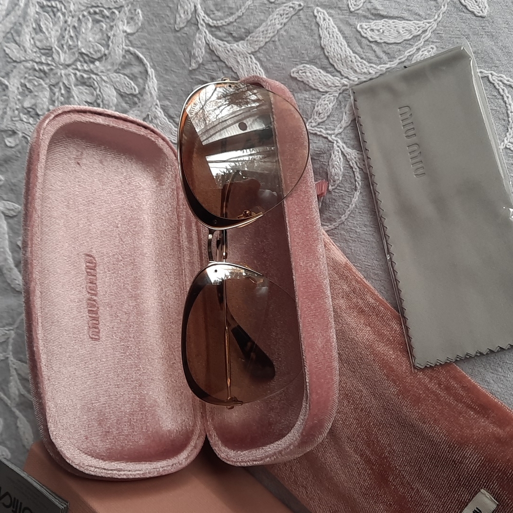 Miu Miu Aviator women's sunglasses